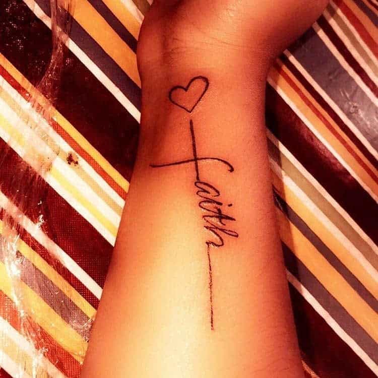 forearm faith cross tattoo tattoosbyca