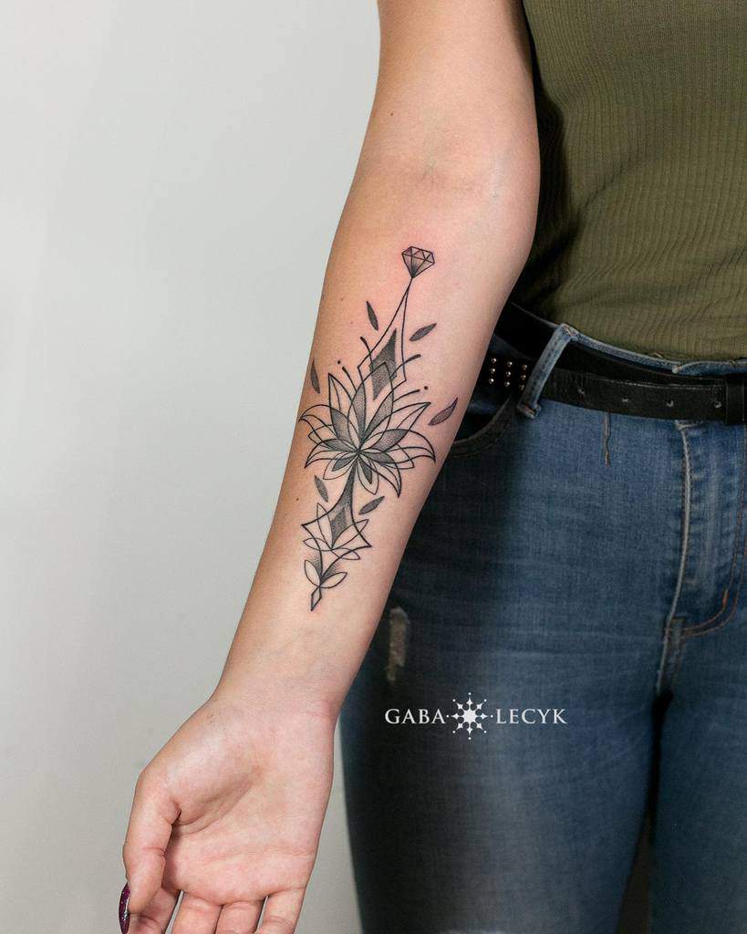forearm geometric flower tattoo