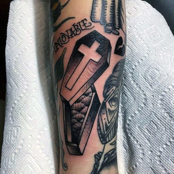 Forearm Guys Cross Coffin Tattoo In Black Ink