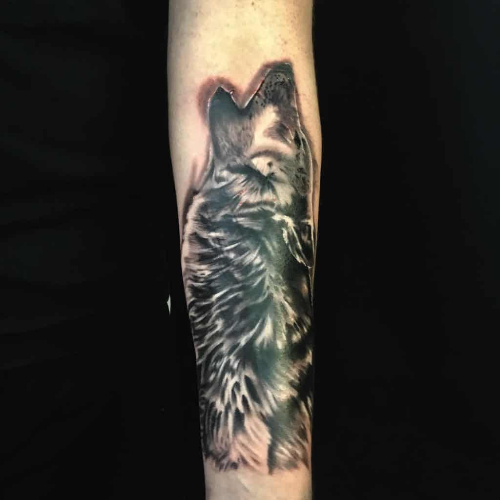 forearm howling wolf tattoo david_corner_ink