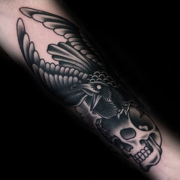 forearm-male-shaded-traditional-crow-skull-tattoo-inspiration