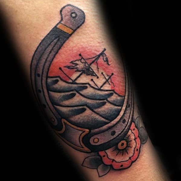 Forearm Male Traditional Horseshoe Sinking Pirate Ship Tattoo