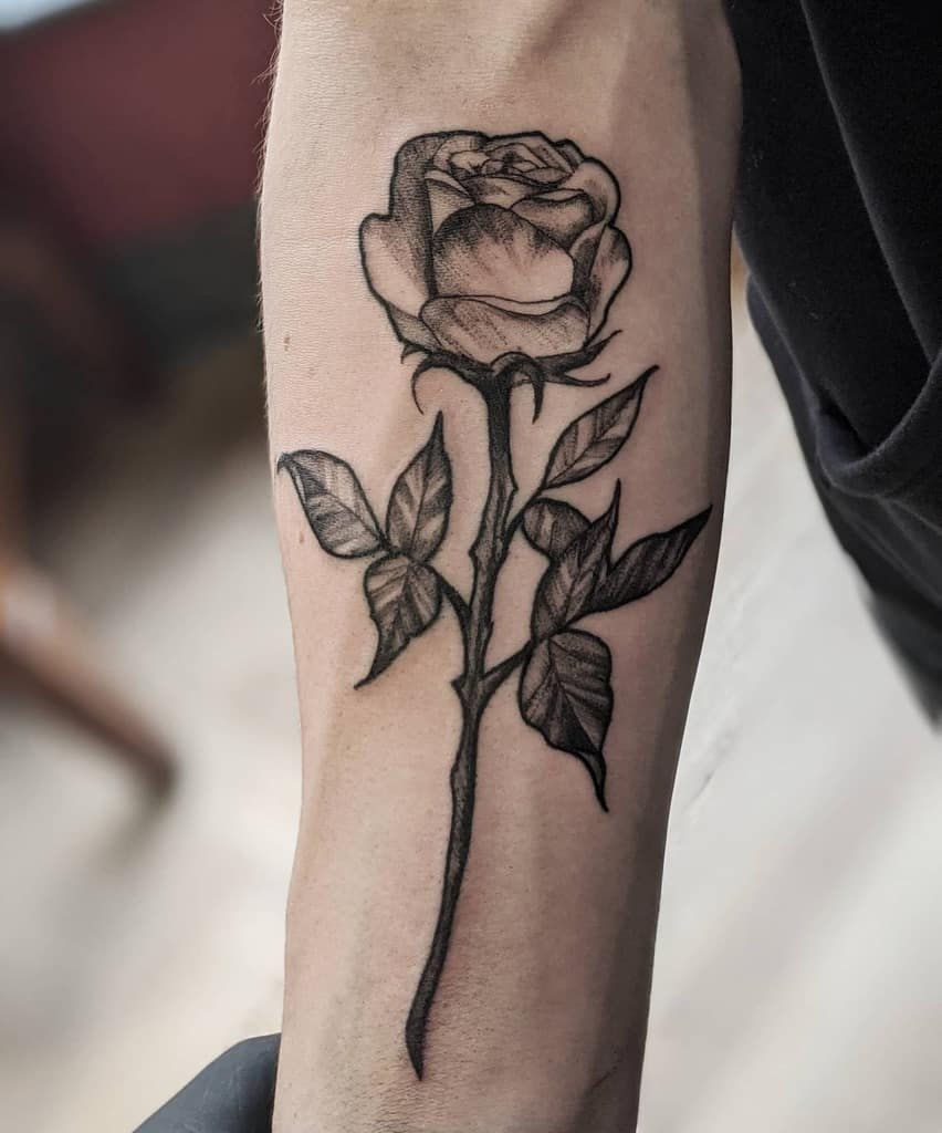 4. Forearm Rose with Stem Tattoo Ideas.