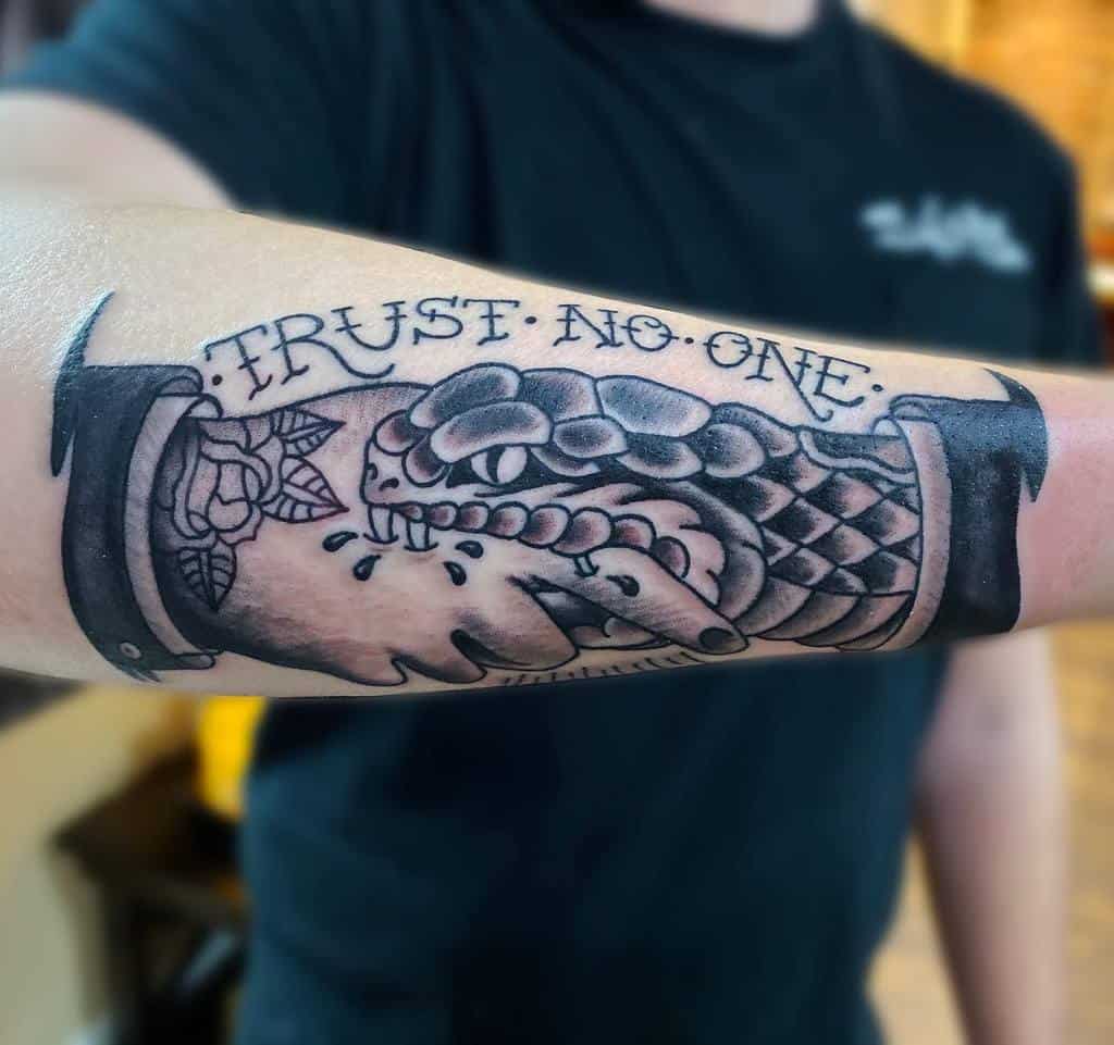 forearm trust no one tattoos chris_swenski_tattoo