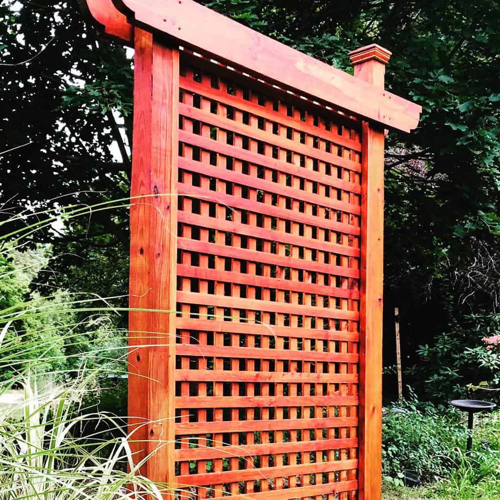red painted wood aisian inspired freestanding lattice garden trellis