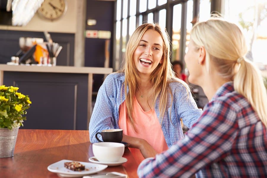 friends talking at a coffee shop