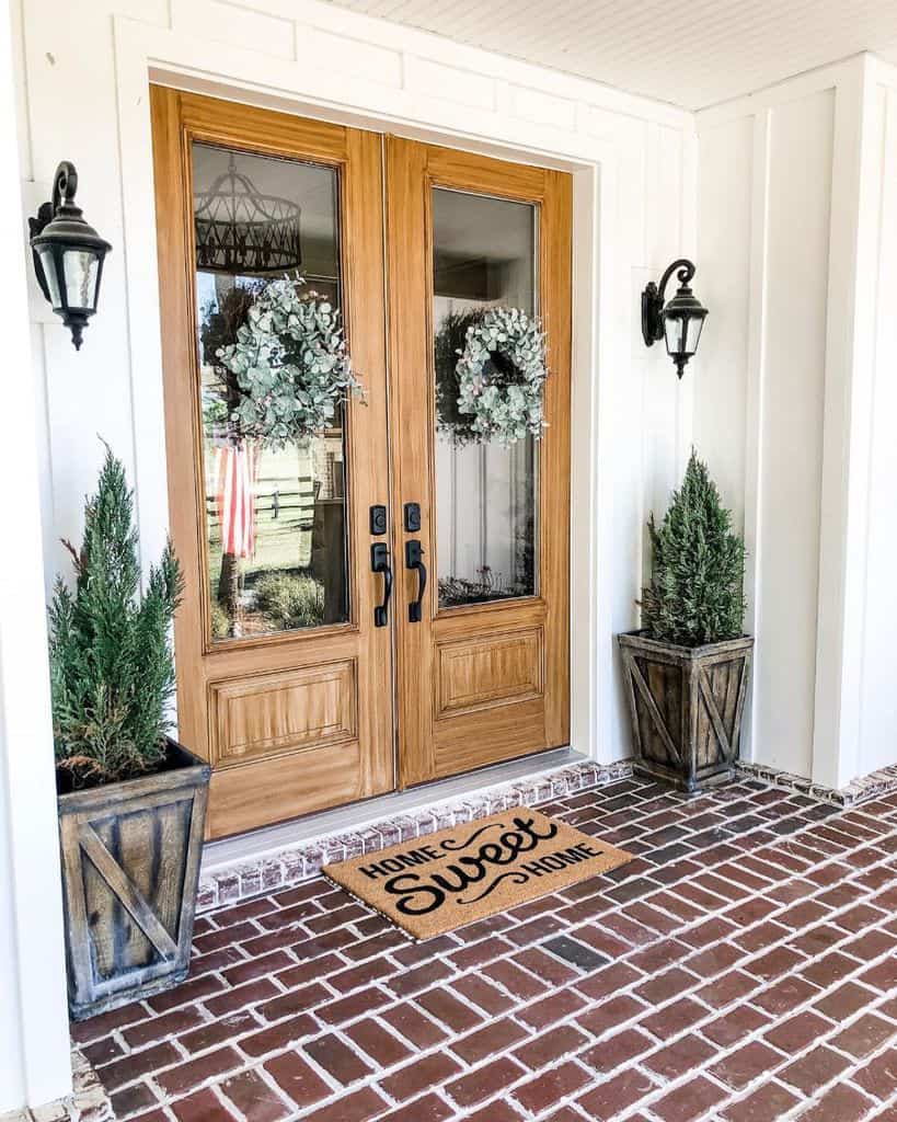wooden front door with glass panels white home