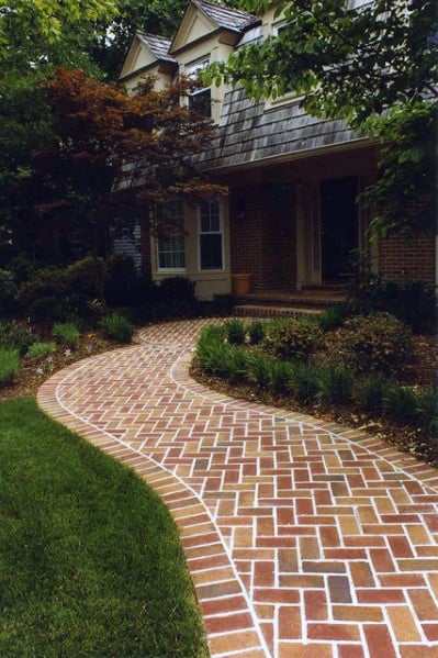 white-grouted brick walkway