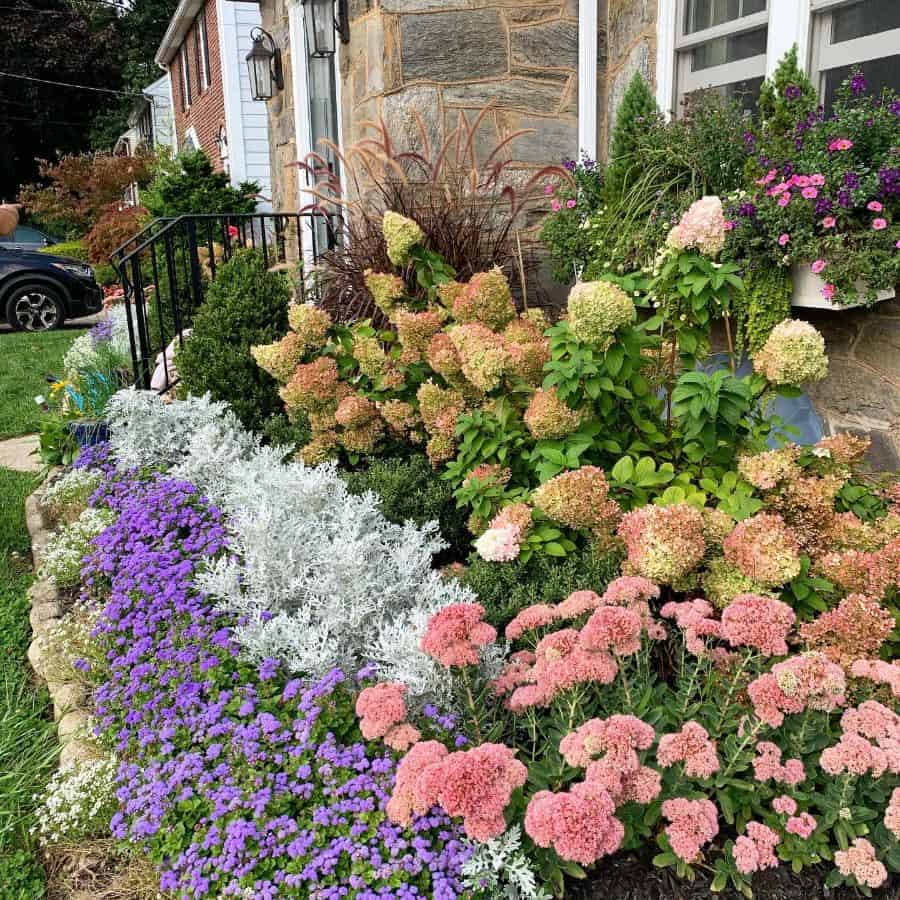large colorful front yard flower bed