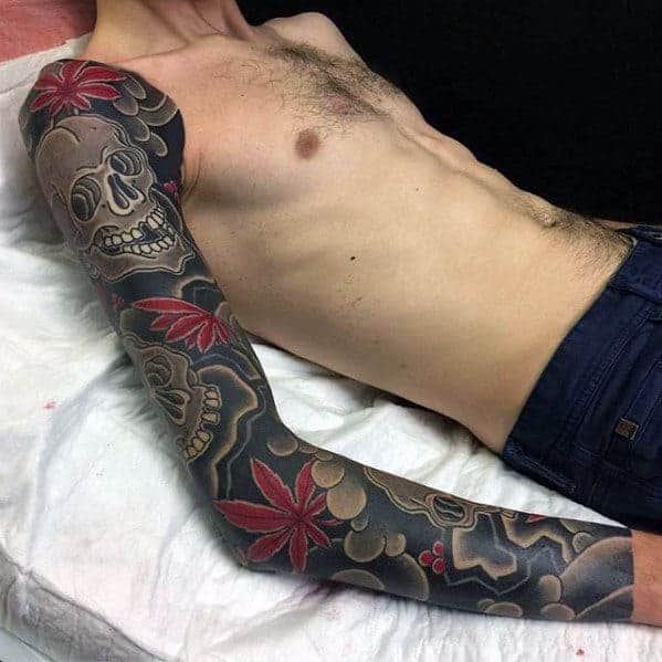 full-arm-japanese-skull-with-red-maple-leaves-mens-sleeve-tattoos