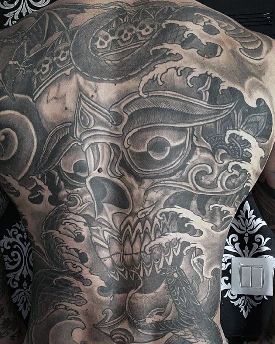 Full Back Artistic Male Tibetan Skull Tattoo Ideas