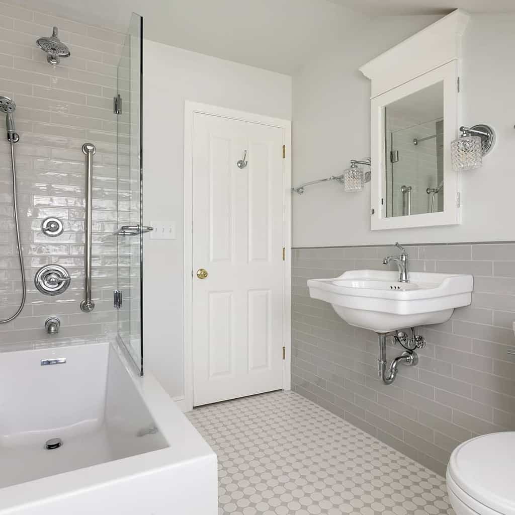 modern minimalist bathroom with gray wall tiles and bath/shower combo