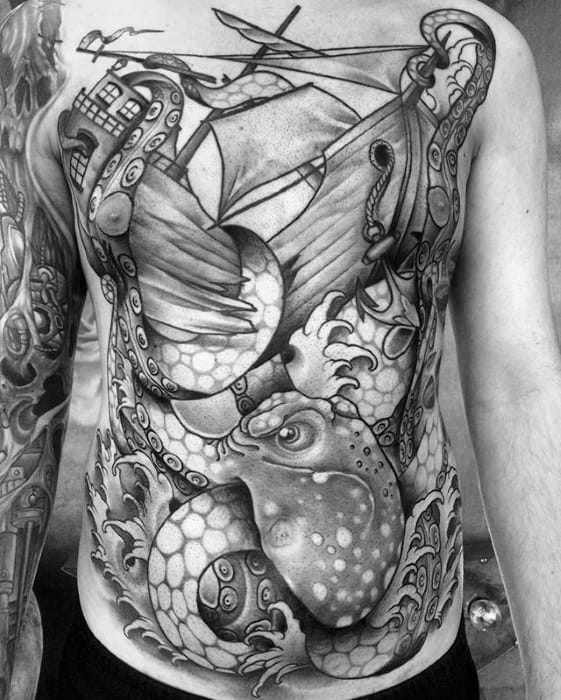 Full Chest Black And Grey Ink Mens Sinking Ship Kraken Octopus Tattoo Design Inspiration