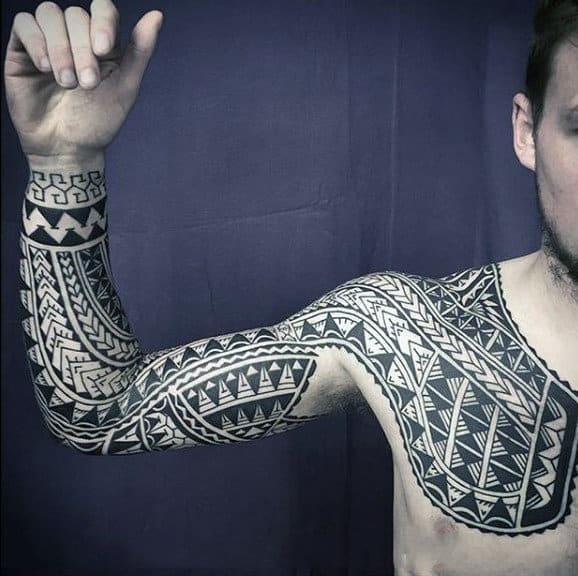 Full Tribal Sleeve Tattoo With Chest Ink On Man