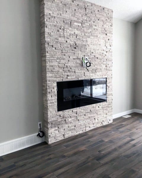 textured stone fireplace tiles