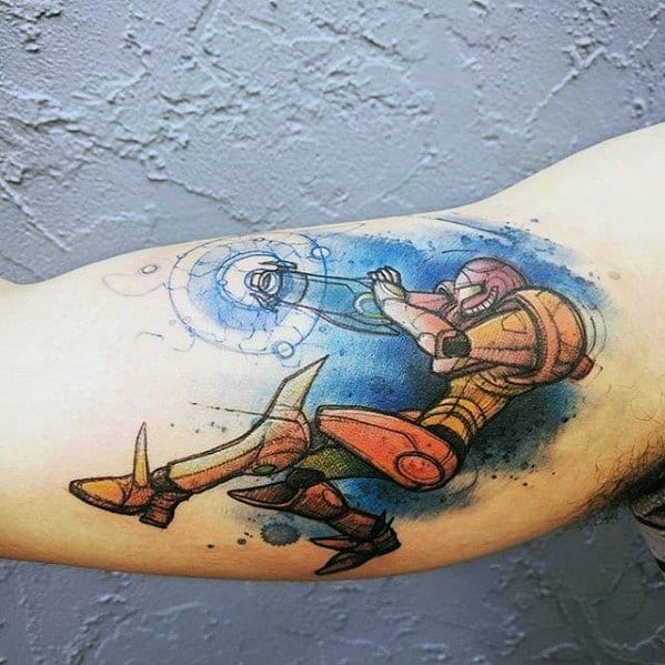 Gamer Male Tattoo On Inner Arm Bicep With Watercolor Design