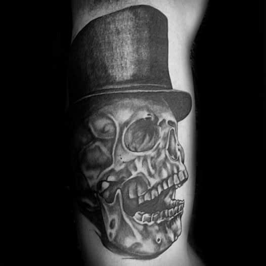 Gentleman With Arm Shaded Black And Grey Ink Skull With Top Hat Tattoo