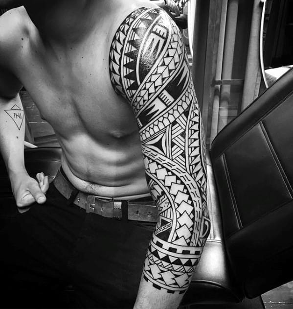 Gentleman With Awesome Half Sleeve Hawaiian Tribal Tattoo