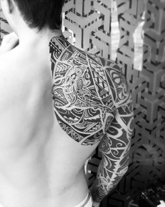 Gentleman With Awesome Shoulder And Sleeve Tribal Tattoo
