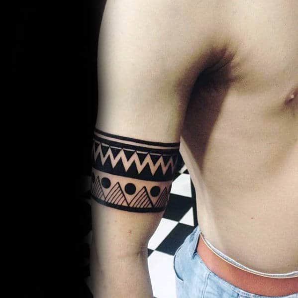 Gentleman With Black Ink Circle And Negative Space Shapes Armband Tribal Tattoos