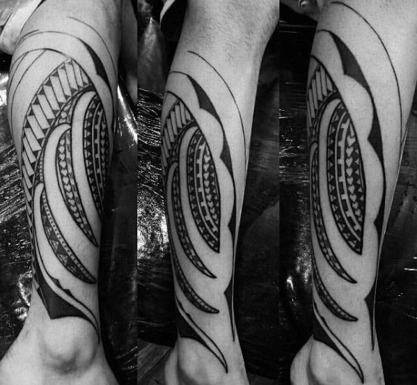 Gentleman With Black Ink Polynesian Tribal Leg Tattoo