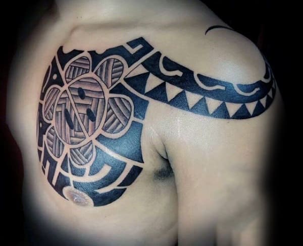 Gentleman With Black Ink Sun Taino Upper Chest And Shoulder Tattoo