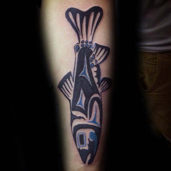 Gentleman With Blue And Black Haida Tribal Fish Forearm Tattoo