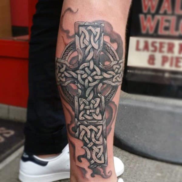 Gentleman With Celtic Cross Tattoo Black And White Ink On Leg