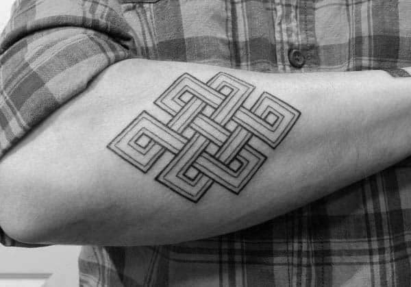 Gentleman With Cool Endless Knot Tattoo On Outer Forearm