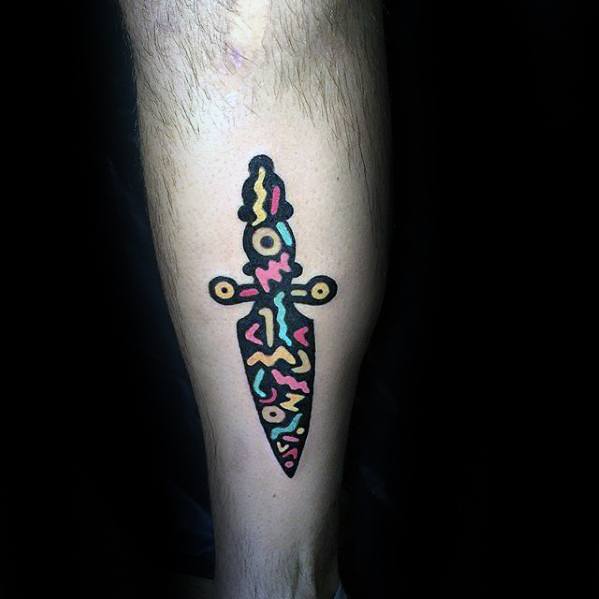 Gentleman With Dagger And Shapes Small Colorful Back Of Leg Tattoo