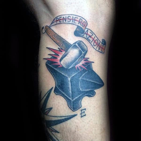 Gentleman With Hammer Striking Anvil Tattoo On Leg