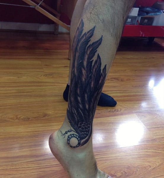 Gentleman With Hermes Wing Ankle And Leg Tattoo Design