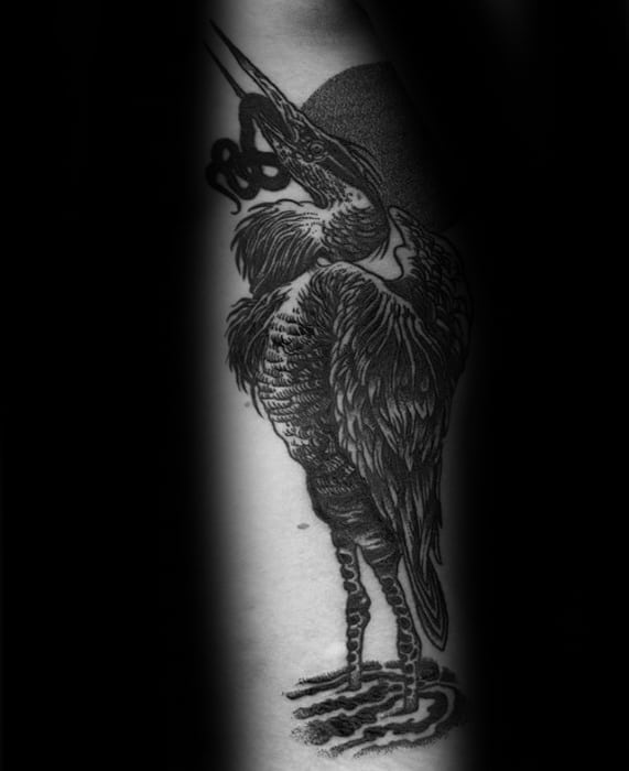 Gentleman With Heron Tattoo On Arm