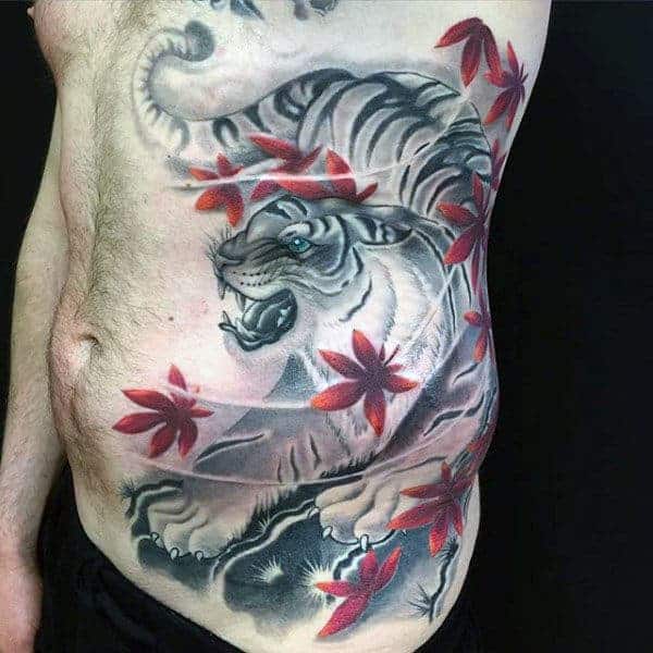 gentleman-with-japanese-and-red-maple-leaves-rib-cage-side-tattoo