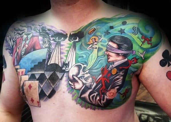 Gentleman With Magician Themed Upper Chest Tattoo