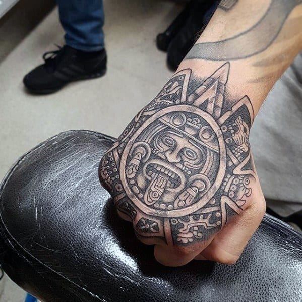 Gentleman With Mayan Calender Tattoo On Hand