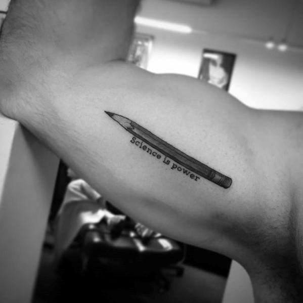 Gentleman With Pencil Tattoo On Inner Arm Bicep