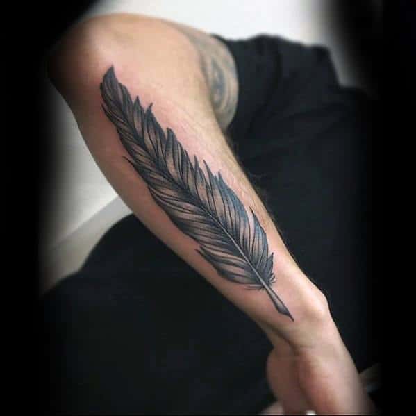 Gentleman With Quill Tattoo On Outer Forearm