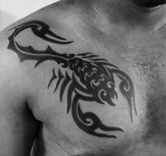Gentleman With Scorpion Tribal Upper Chest Tattoo