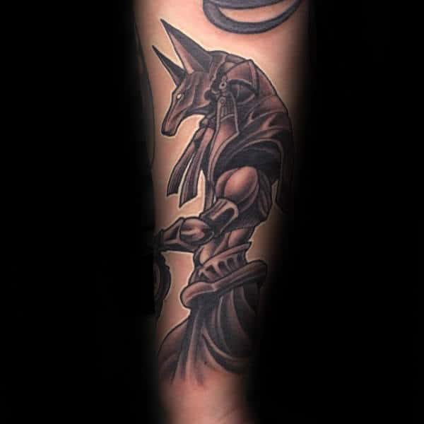 Gentleman With Shaded Anubis Tattoo On Inner Forearm