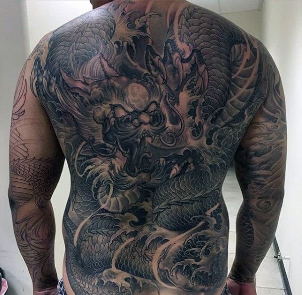 Gentleman With Shaded Incredible Back Tattoo Of Dragon