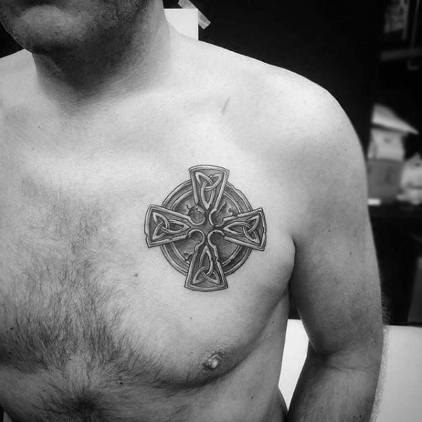 Gentleman With Small Celtic Cross Upper Chest Tattoo