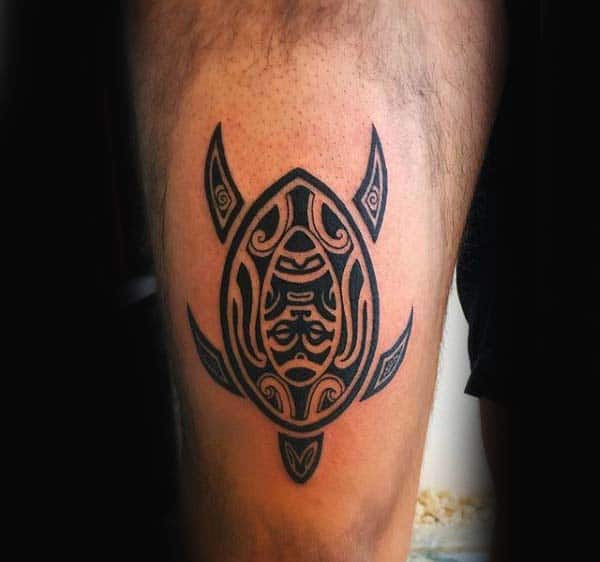 Gentleman With Small Turtle Tribal Tattoo On Leg Calf