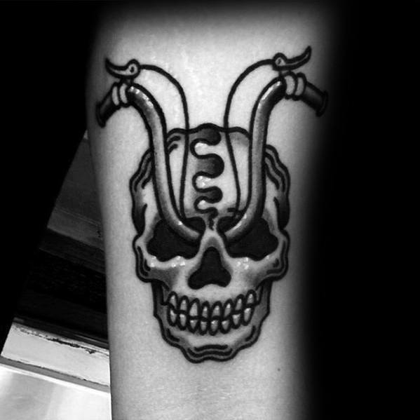 Gentleman With Small Unique Skull Handlebar Traditional Forearm Tattoo