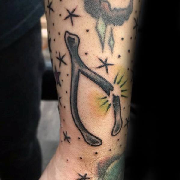 Gentleman With Small Wishbone Filler Forearm Tattoo