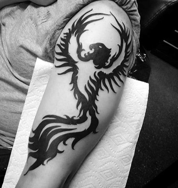 Gentleman With Soaring Phoenix Tribal Arm Tattoo