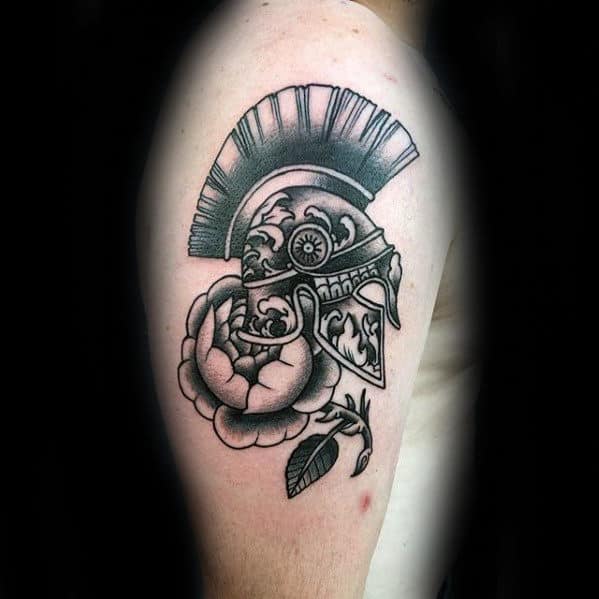gentleman-with-traditional-flower-spartan-helmet-arm-tattoo