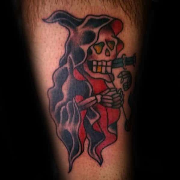 Gentleman With Traditional Reaper Tattoo On Arm