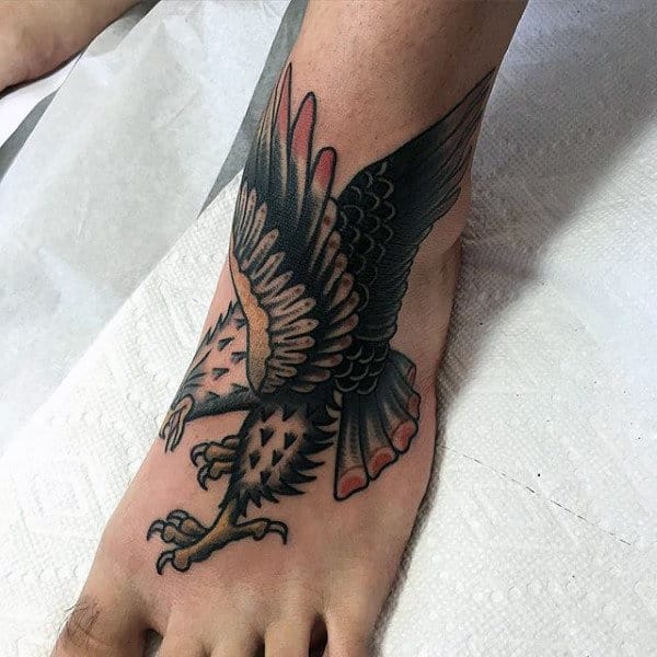 Gentleman With Traditional Tattoo On Foot With Eagle Design