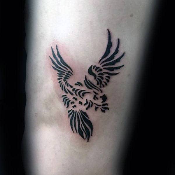 Gentleman With Tribal Eagle Tatto On Rib Cage Side